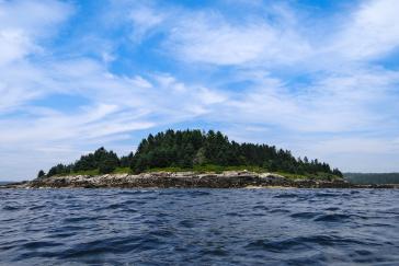 Folly Island and the Atlantic ocean on a partially cloudy day. 