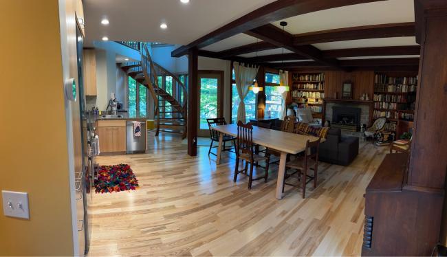 View of the dining room and library from the kitchen.
