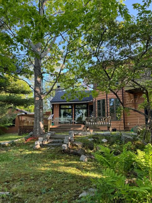 Back deck of Maine home with new windows.