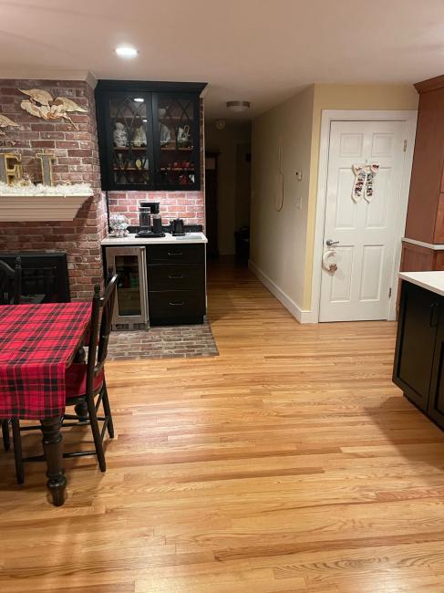 Refinished wood floors and new bar and cabinetry.