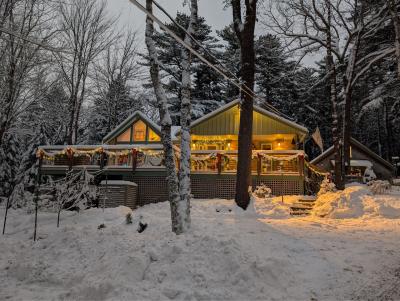 Dream retirement cabin at Christmas in the snowy Maine woods.